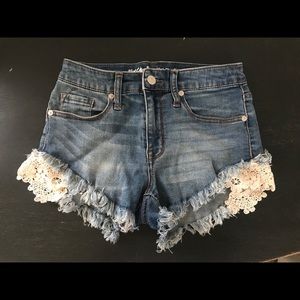 Blue jean frayed edge with white lace shorts